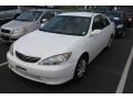 Super White - Camry LE Photo No. 4