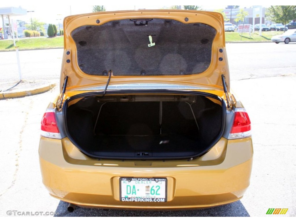 2009 Focus SE Sedan - Amber Gold Metallic / Medium Stone photo #8