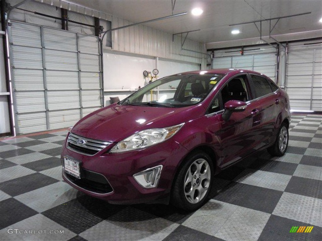 2011 Fiesta SEL Sedan - Bright Magenta Metallic / Plum/Charcoal Black Leather photo #3