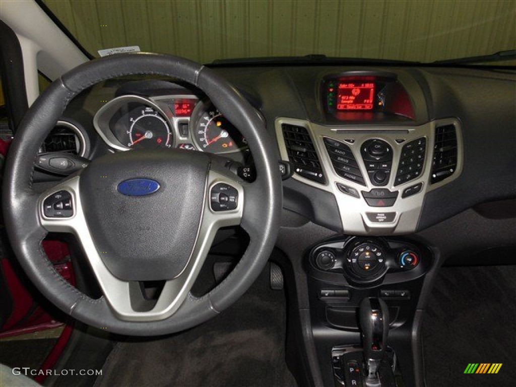2011 Fiesta SEL Sedan - Bright Magenta Metallic / Plum/Charcoal Black Leather photo #13