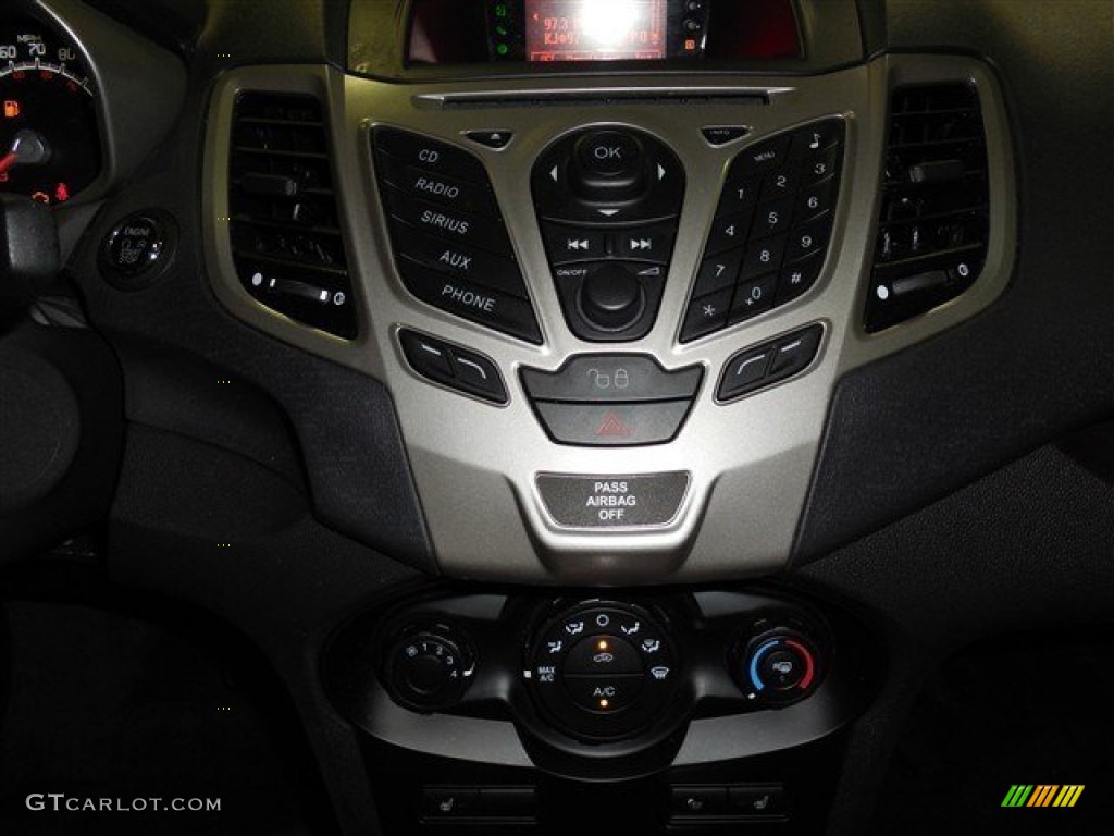 2011 Fiesta SEL Sedan - Bright Magenta Metallic / Plum/Charcoal Black Leather photo #14