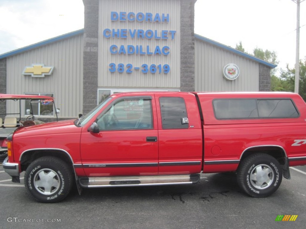 1998 Sierra 1500 SLE Extended Cab 4x4 - Victory Red / Pewter photo #1