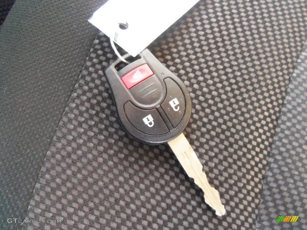 2011 Rogue S AWD - Cayenne Red / Black photo #22