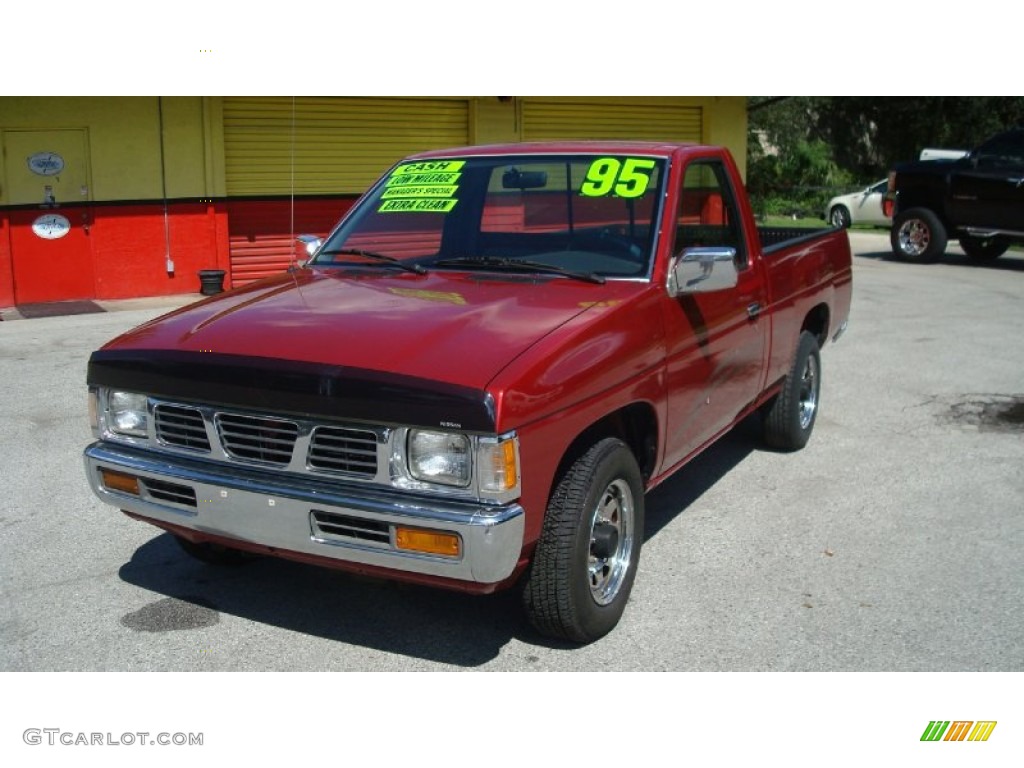 1995 Hardbody Truck XE Regular Cab - Cherry Red Pearl Metallic / Gray photo #1