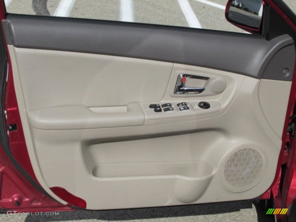 2009 Spectra EX Sedan - Spicy Red Metallic / Beige photo #10