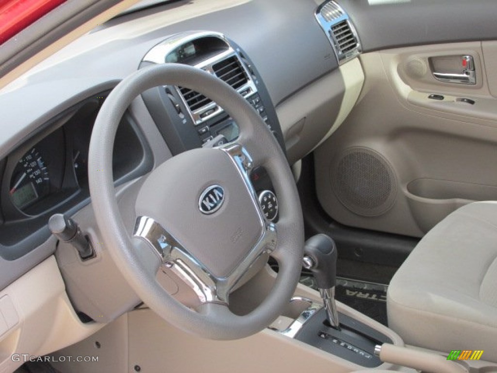 2009 Spectra EX Sedan - Spicy Red Metallic / Beige photo #11