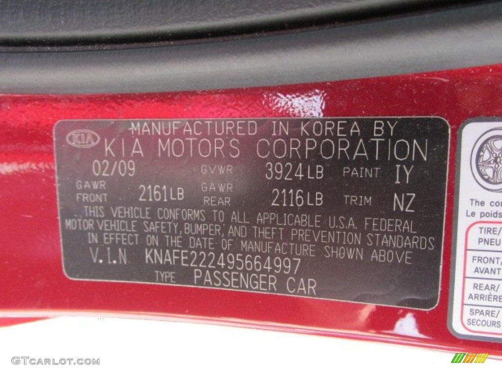2009 Spectra EX Sedan - Spicy Red Metallic / Beige photo #24