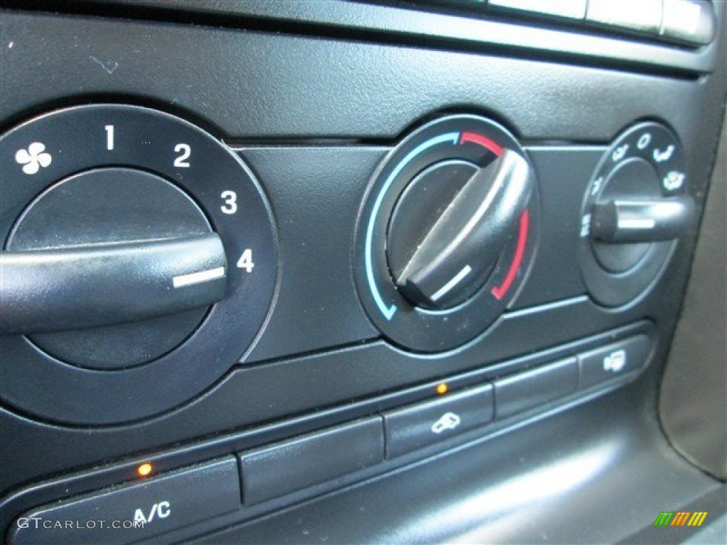2006 Mustang V6 Premium Coupe - Black / Black photo #17