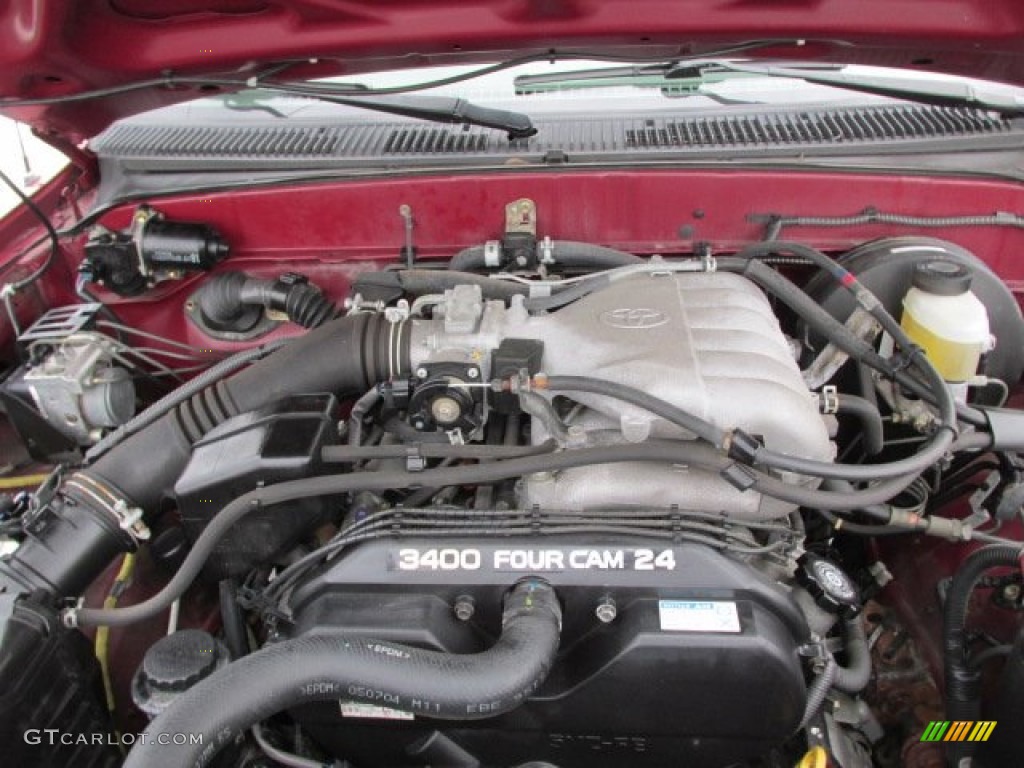 2004 Tacoma V6 Xtracab 4x4 - Impulse Red Pearl / Charcoal photo #9