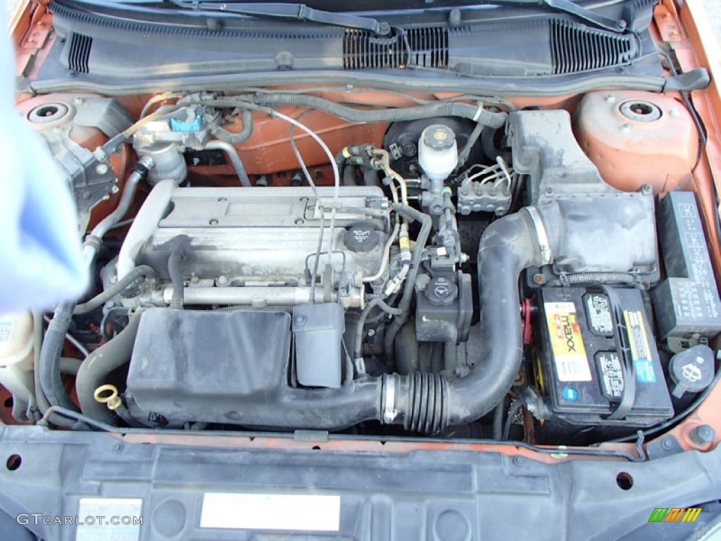 2004 Cavalier Sedan - Sunburst Orange / Graphite photo #18