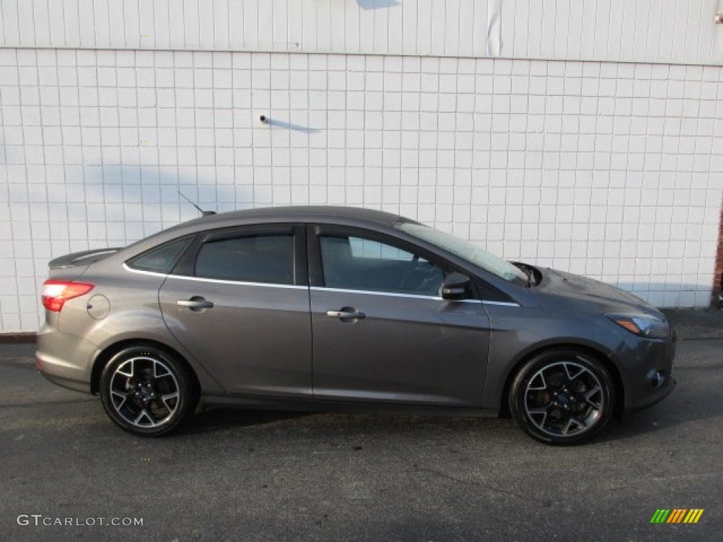 2012 Focus Titanium Sedan - Sterling Grey Metallic / Charcoal Black Leather photo #2