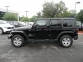 2011 Black Jeep Wrangler Unlimited Sahara 4x4  photo #3