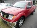2007 Red Brawn Nissan Frontier SE King Cab 4x4  photo #1
