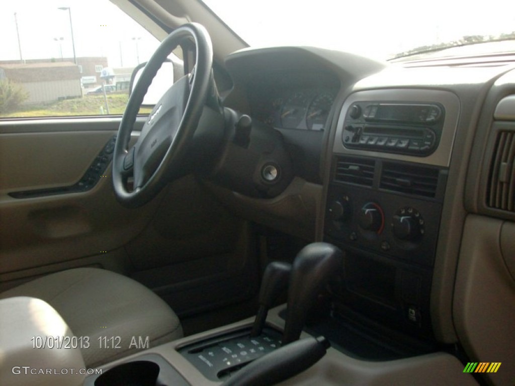 2003 Grand Cherokee Laredo 4x4 - Dark Garnet Red Pearl / Taupe photo #10