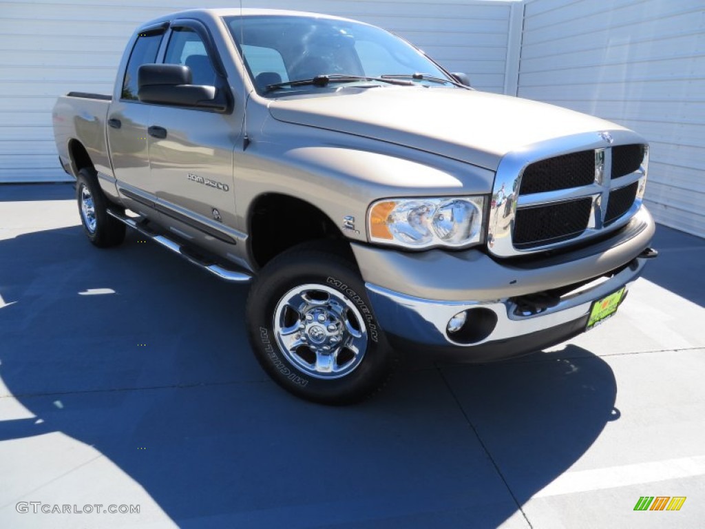 2004 Ram 2500 SLT Quad Cab 4x4 - Light Almond Pearl Metallic / Taupe photo #1