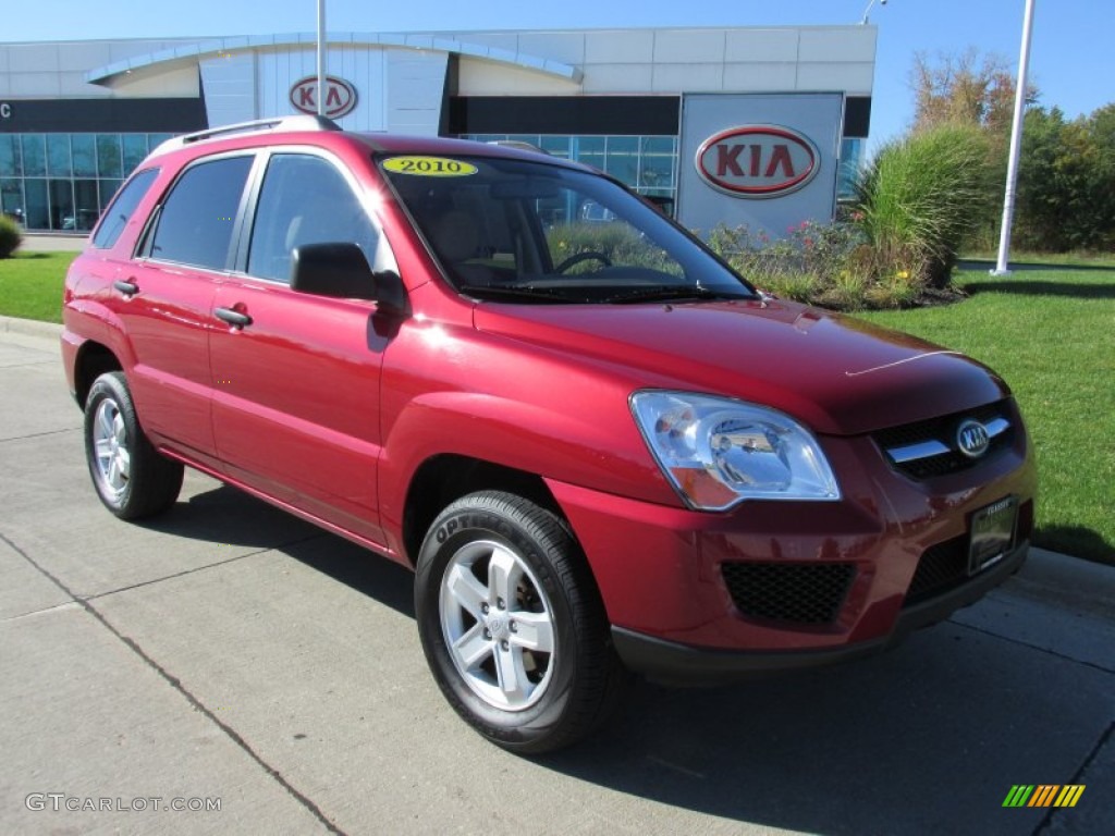 2010 Sportage LX V6 4x4 - Volcanic Red / Beige photo #1