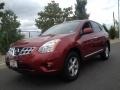 2013 Cayenne Red Nissan Rogue S AWD  photo #1