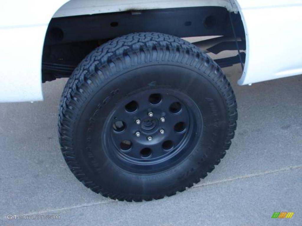 2004 Silverado 1500 LS Extended Cab 4x4 - Summit White / Dark Charcoal photo #10