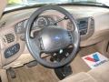 1999 Ford F150 Medium Prairie Tan Interior Steering Wheel Photo