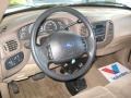 Medium Prairie Tan Steering Wheel Photo for 1999 Ford F150 #86684931