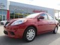 Red Brick 2014 Nissan Versa 1.6 SV Sedan