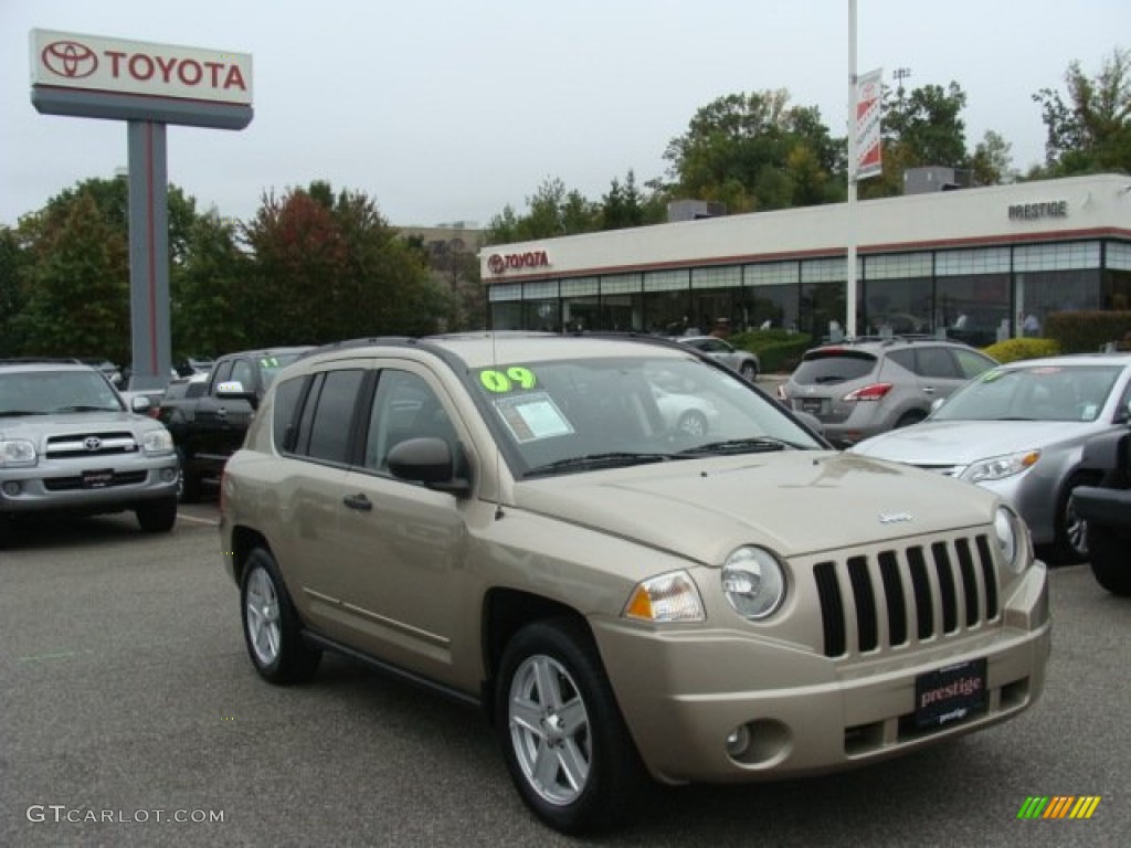 2009 Compass Sport - Light Sandstone Metallic / Dark Slate Gray/Medium Slate Gray photo #1