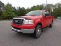 2004 Bright Red Ford F150 XLT SuperCab 4x4  photo #1