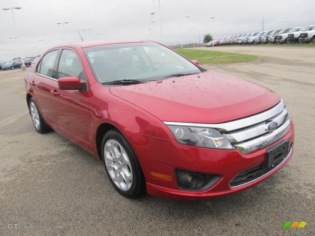 2010 Fusion SE - Red Candy Metallic / Medium Light Stone photo #5