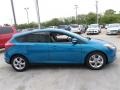 2014 Blue Candy Ford Focus SE Hatchback  photo #6