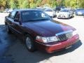 2004 Dark Toreador Red Metallic Mercury Grand Marquis GS  photo #1