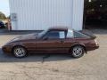 Brown 1983 Mazda RX-7 Coupe