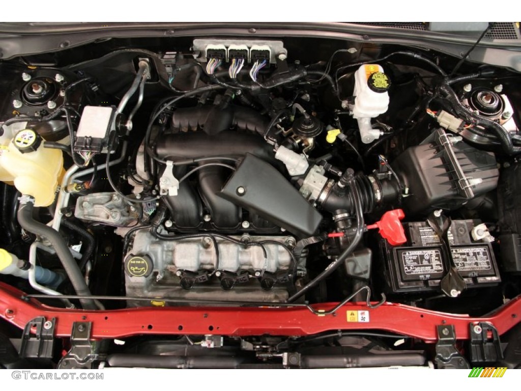 2008 Mariner V6 4WD - Vivid Red Metallic / Black photo #15