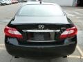 Black Obsidian - M 56x AWD Sedan Photo No. 4
