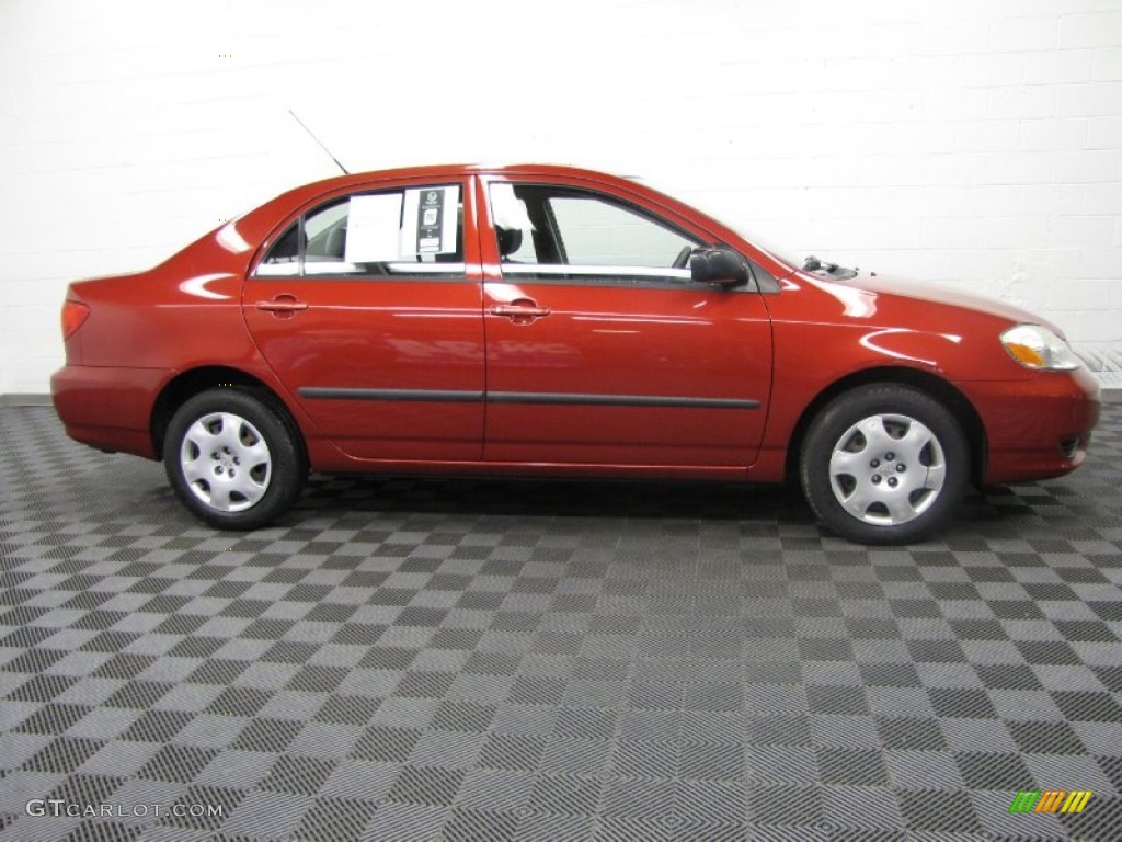 Impulse Red 2003 Toyota Corolla CE Exterior Photo #86935864