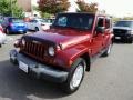 2007 Red Rock Crystal Pearl Jeep Wrangler Unlimited Sahara 4x4  photo #1