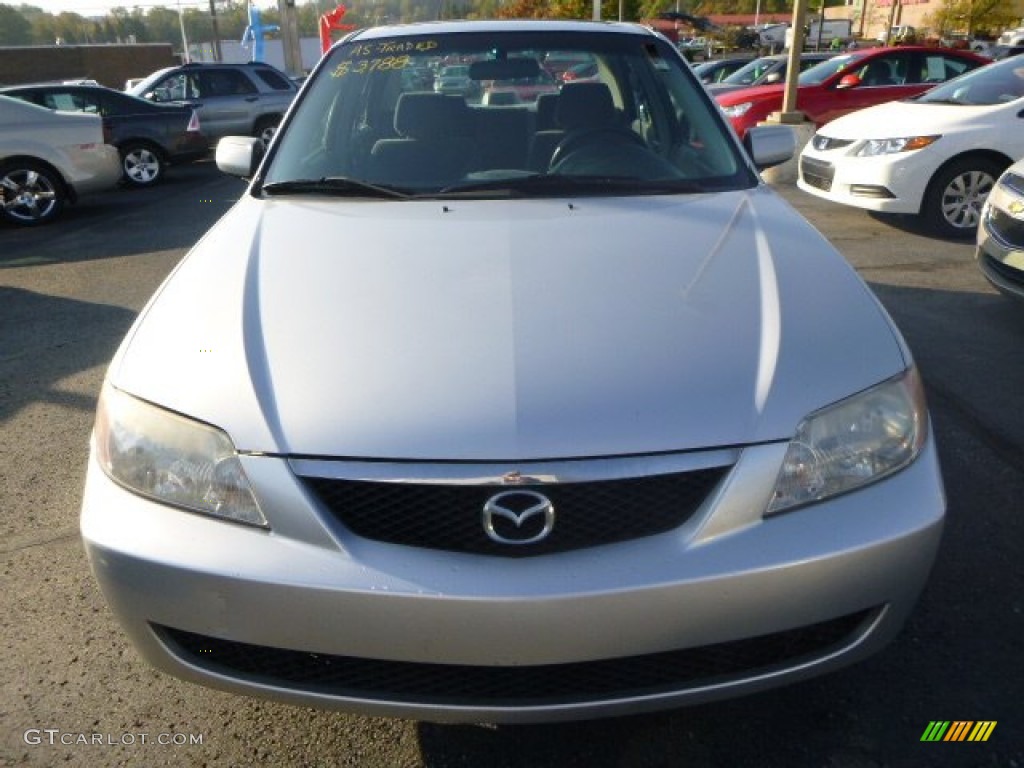 2002 Protege LX - Sunlight Silver Metallic / Off Black photo #6