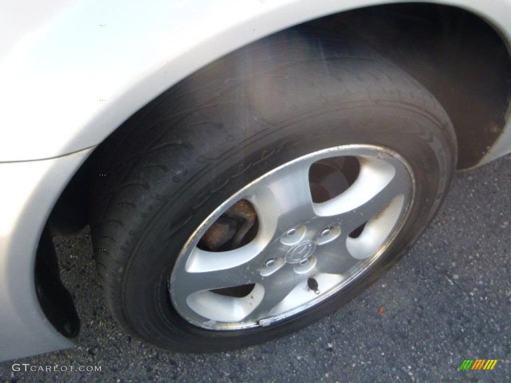 2002 Protege LX - Sunlight Silver Metallic / Off Black photo #7