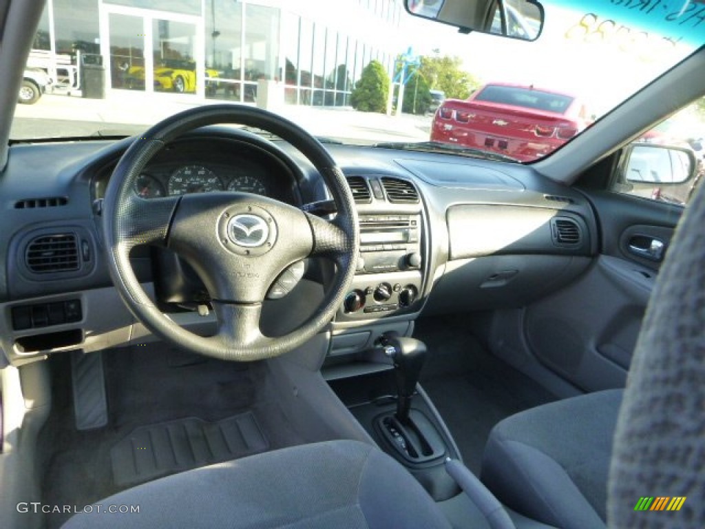 2002 Protege LX - Sunlight Silver Metallic / Off Black photo #10