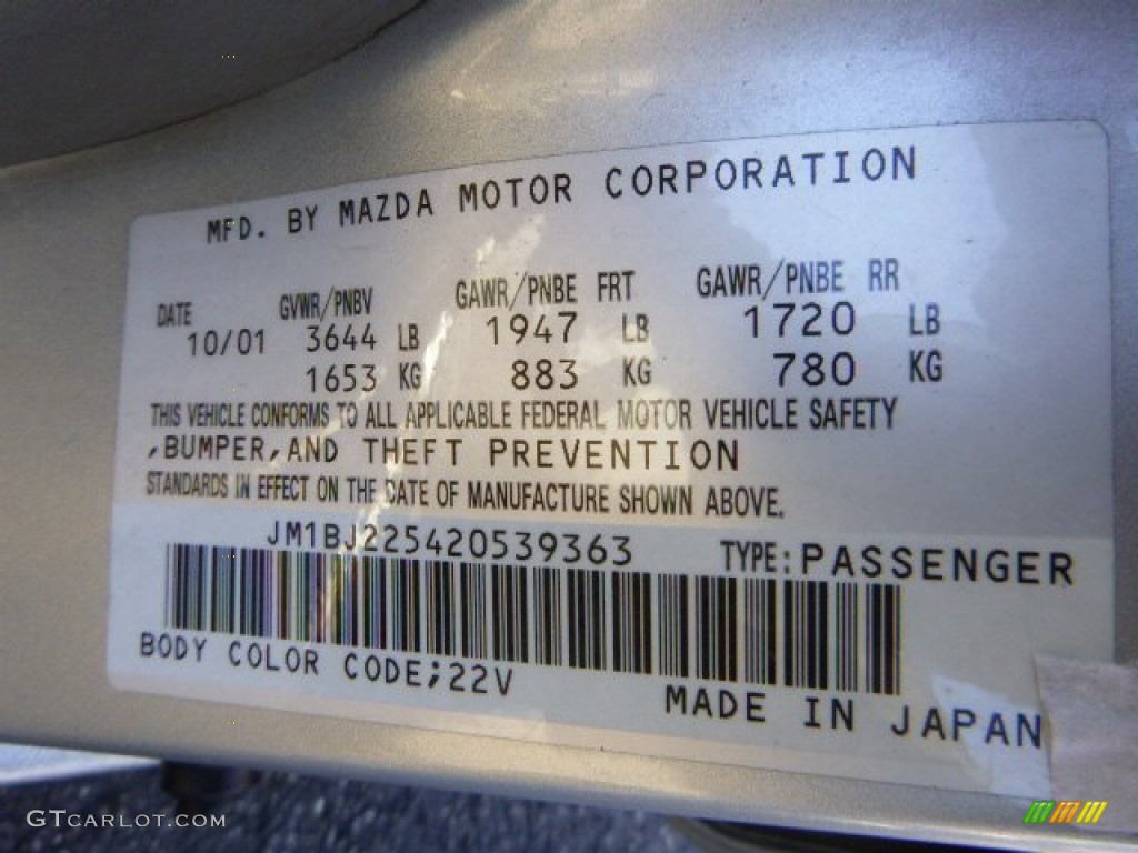 2002 Protege LX - Sunlight Silver Metallic / Off Black photo #14