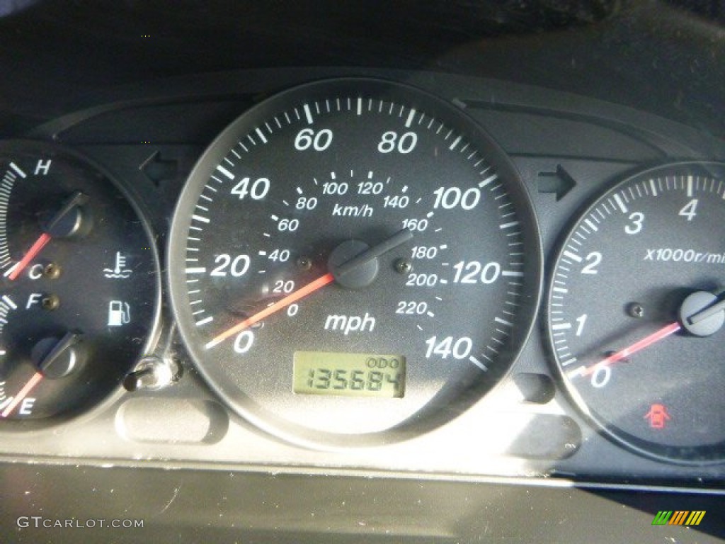 2002 Protege LX - Sunlight Silver Metallic / Off Black photo #15