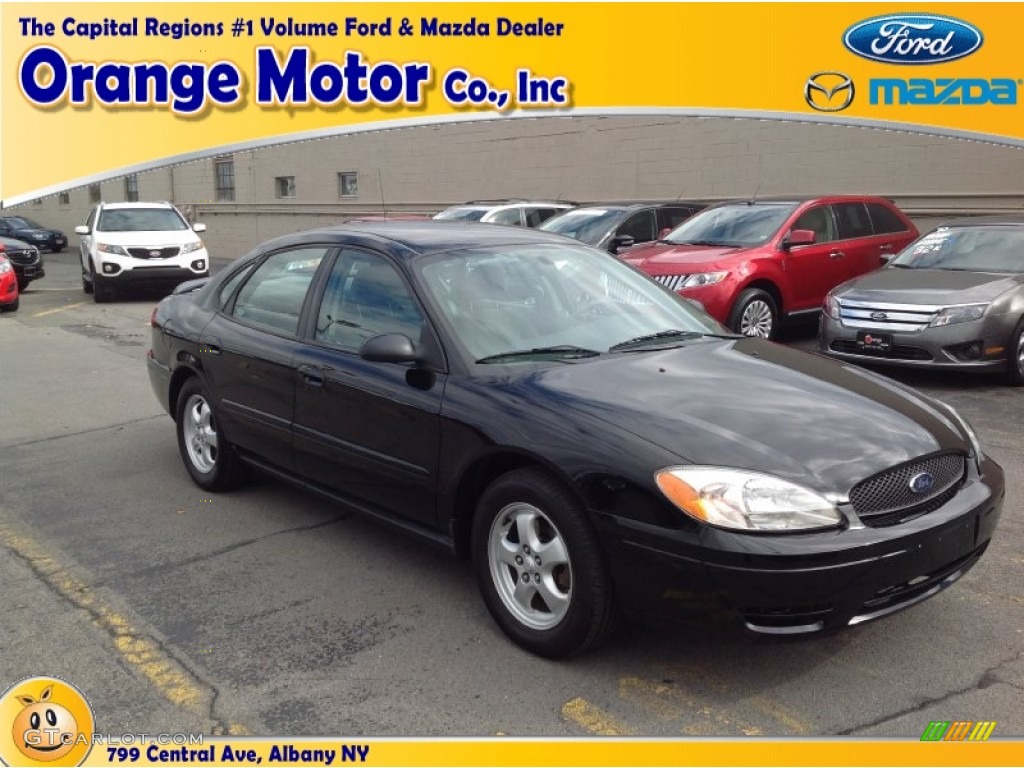 2006 Taurus SE - Black / Medium/Dark Pebble Beige photo #1