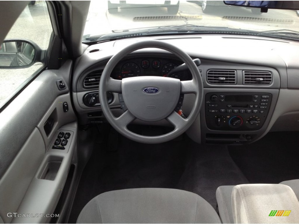 2006 Taurus SE - Black / Medium/Dark Pebble Beige photo #11