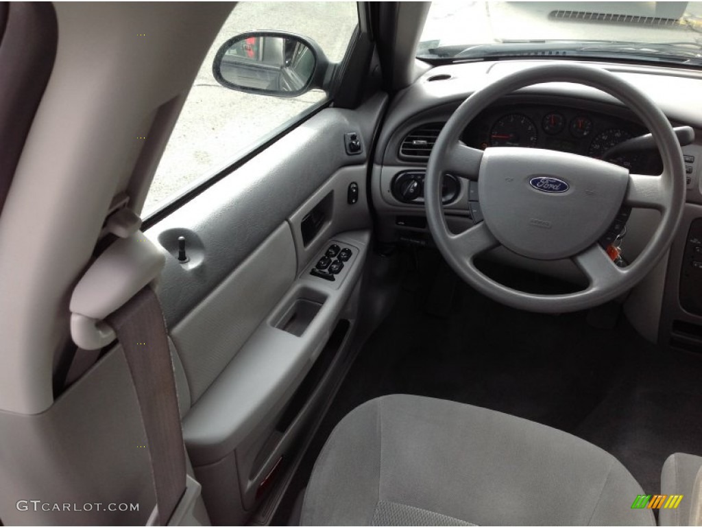 2006 Taurus SE - Black / Medium/Dark Pebble Beige photo #13