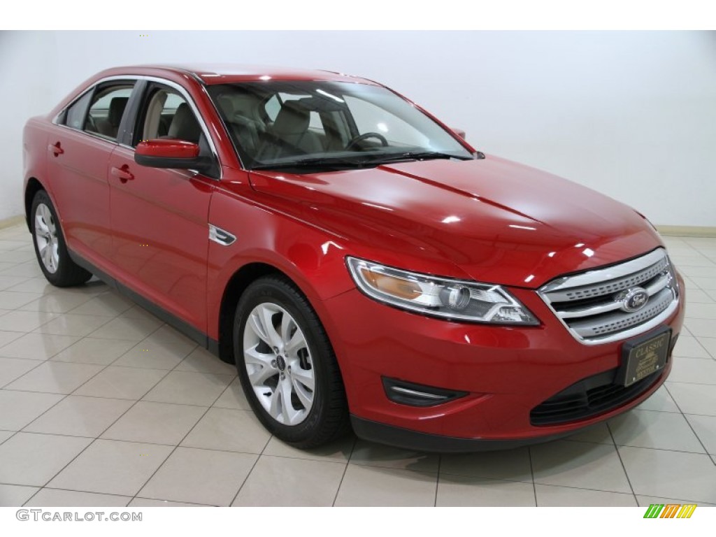 2010 Taurus SEL - Red Candy Metallic / Light Stone photo #1
