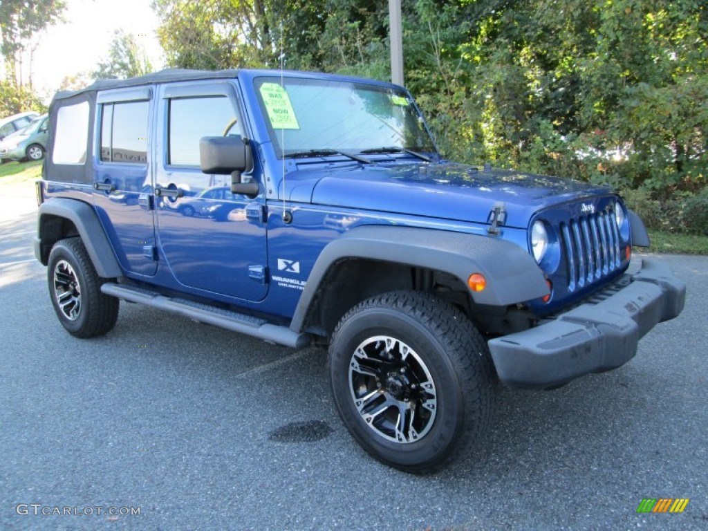 Deep Water Blue Pearl 2009 Jeep Wrangler Unlimited X 4x4 Exterior Photo #87075720