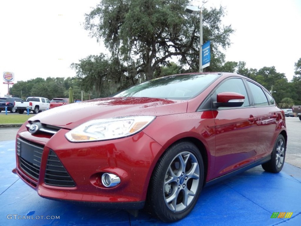 Ruby Red 2013 Ford Focus SE Hatchback Exterior Photo #87108309