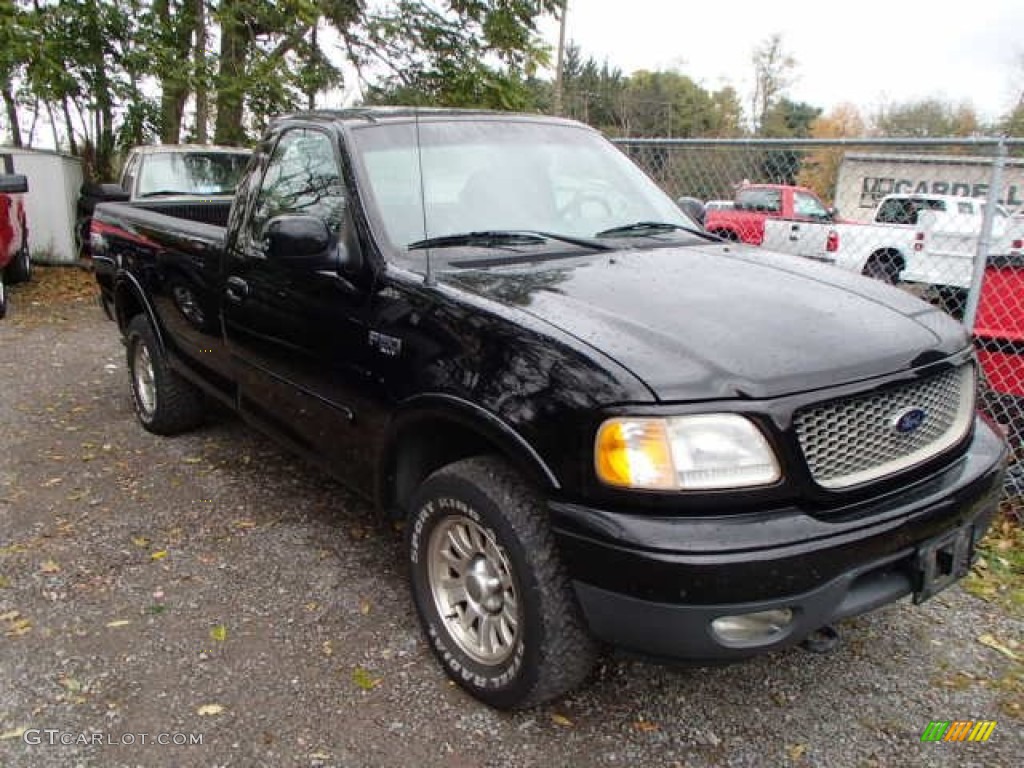 2001 F150 XLT Regular Cab 4x4 - Black / Medium Graphite photo #1