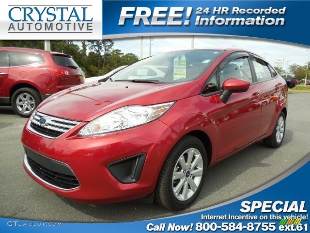2011 Fiesta SE Sedan - Red Candy Metallic / Charcoal Black/Blue Cloth photo #1