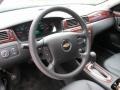 2010 Chevrolet Impala Ebony Interior Steering Wheel Photo