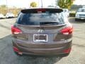 Kona Bronze - Tucson SE AWD Photo No. 6
